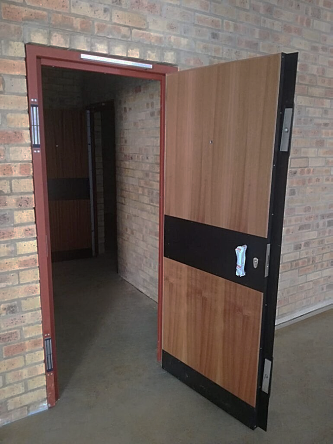 Anti-bandit door